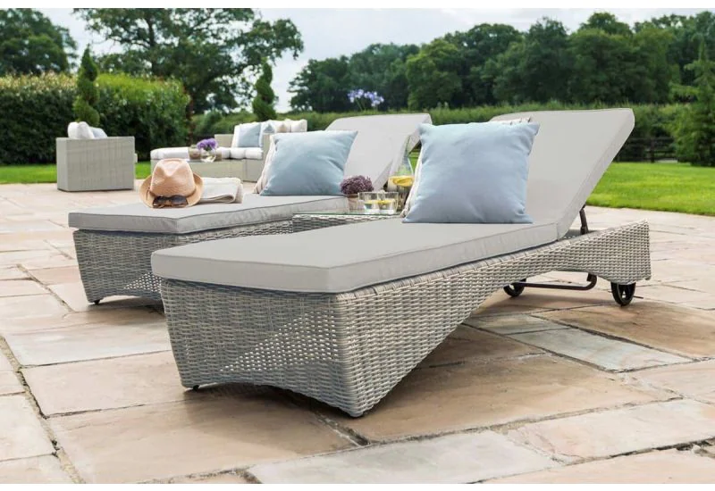 Pair rattan sun loungers sale