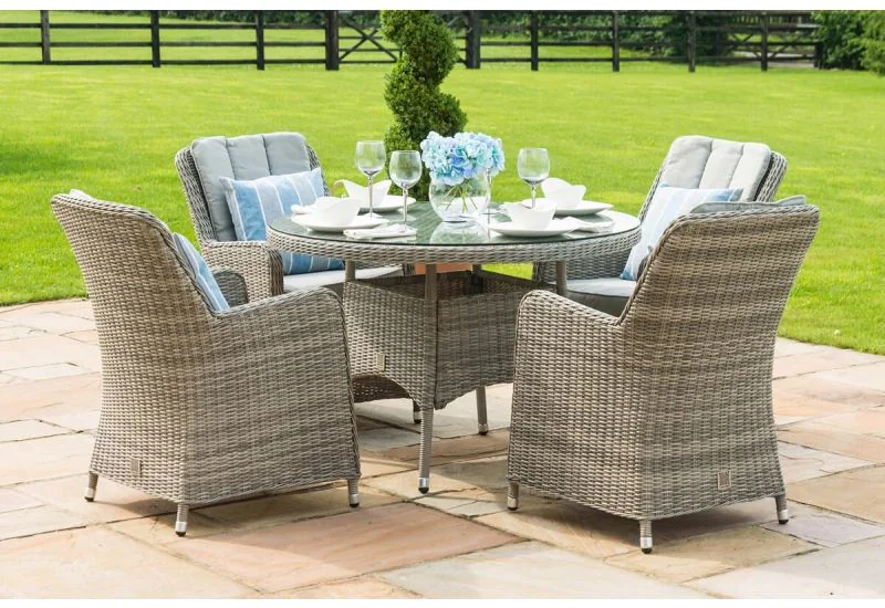 Round rattan garden sales table and 4 chairs