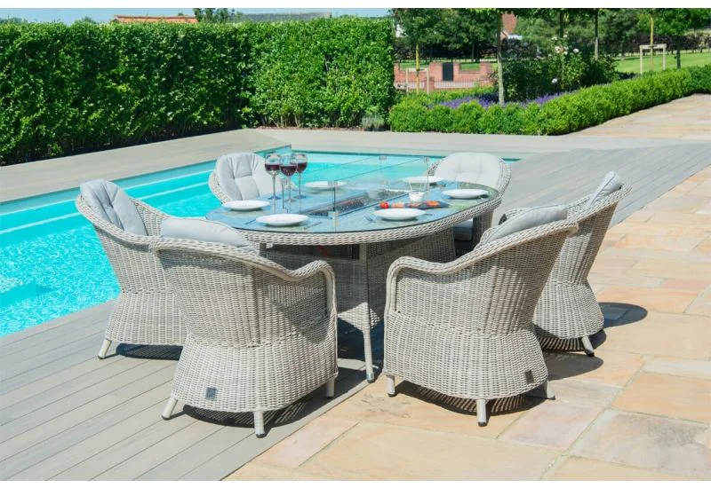 6 seater rattan garden store table and chairs